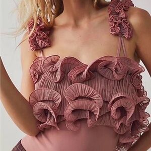 Free People Ruffled Pink bodysuit Size:S Never Worn!